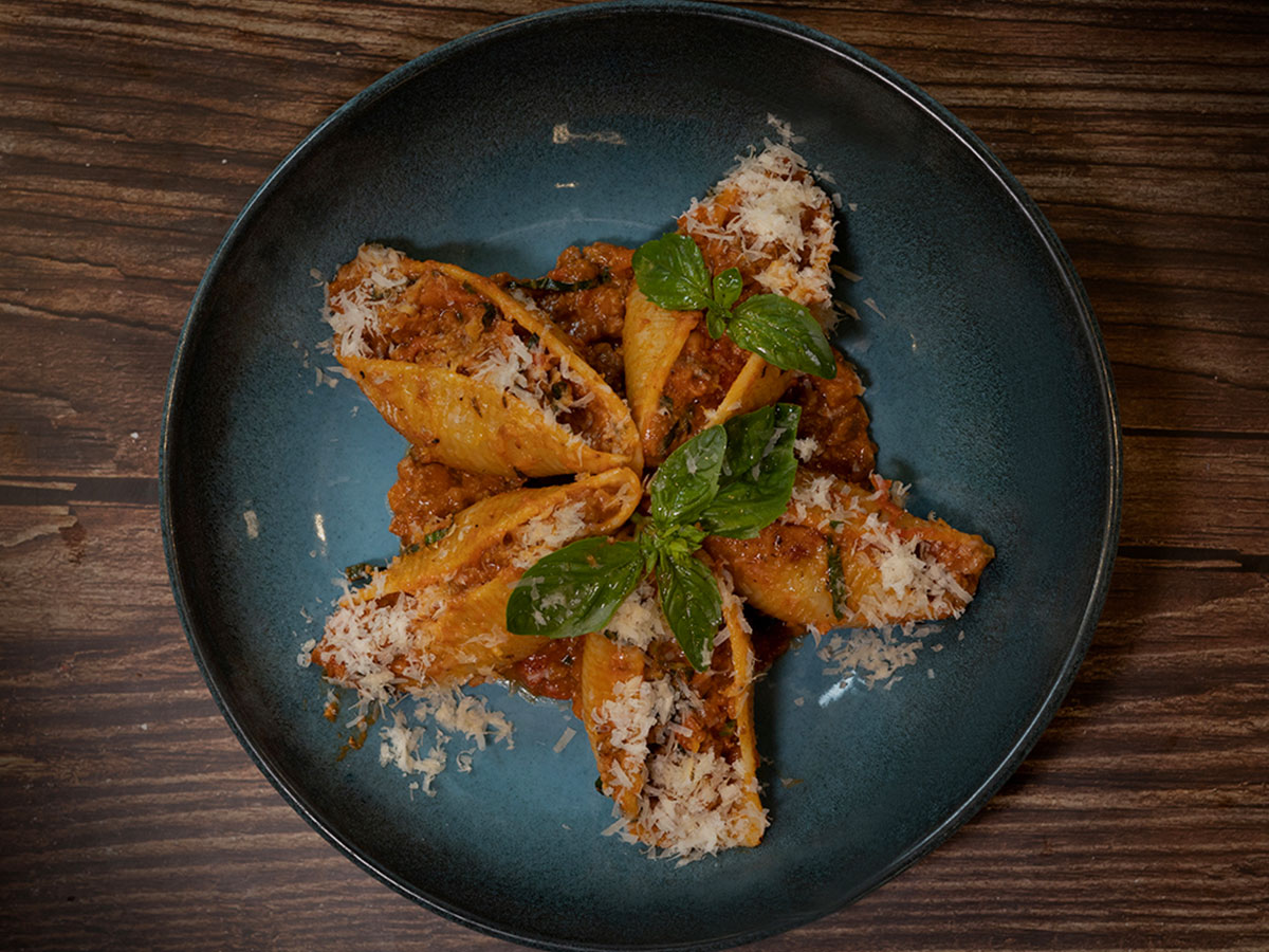 Conchiglioni pasta with meat and tomato sauce